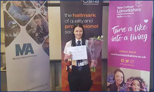 Award and flowers for CSS Apprentice Corrie Stewart