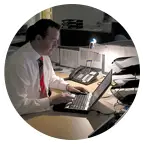 man working at laptop in office