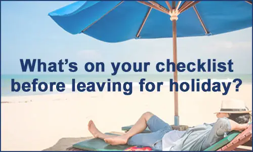 man lying on sun lounger on beach under large umbrella with hat over his face, text reads what's on your checklist before leaving for holiday?