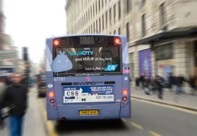 Photo of back of bus with CSS advert.