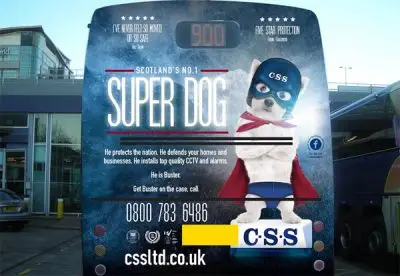 Photo of back of bus with CSS super dog advert.