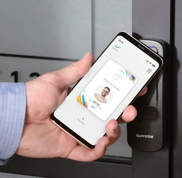 Mobile phone showing biometric access control app with a person's photo and username.