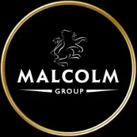Malcolm Group logo, a black box with a gold circle inside; inside the circle is the gold outline of a rampant lion and Malcolm Group in white text.