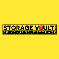 Storage Vault logo, a yellow box with Storage Vault written in black text in the middle. The a in vault is a red padlock. Under this is says drive-up self storage in yellow on a black band.