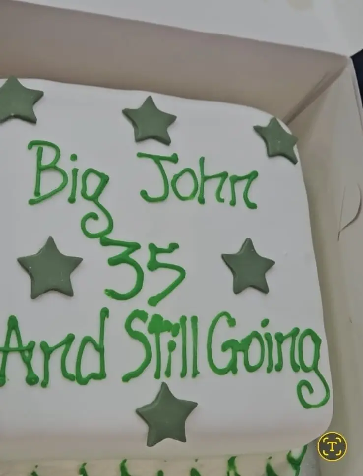 white cake with green stars and text 'big John 35 and still going' - css celebrates john mcdaid work anniversary
