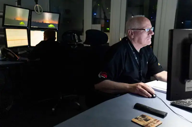 CSS Alarm Receiving Centre with operative at computer.