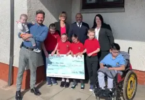 Group photo of Campsie View School with cheque from Sportsmans Dinner event. CSS attended the annual Sportsman's Dinner at The Eagle Lodge, raising cash for some incredible local charities and organisations.
