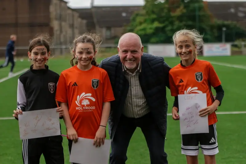 CSS Paul Connelly with young Glasgow City FC fans and their autographs